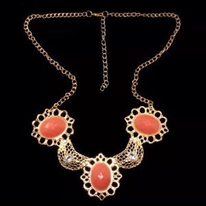 Coral and gold statement necklace